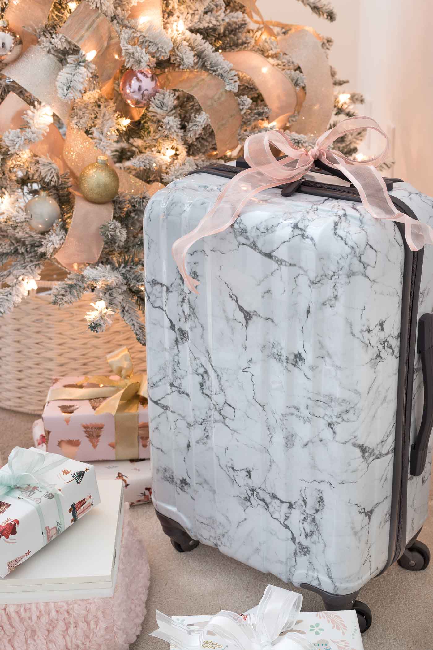 https://www.drivenbydecor.com/wp-content/uploads/2019/11/marble-carry-on-suitcase-christmas-gift-idea-teen-girls.jpg