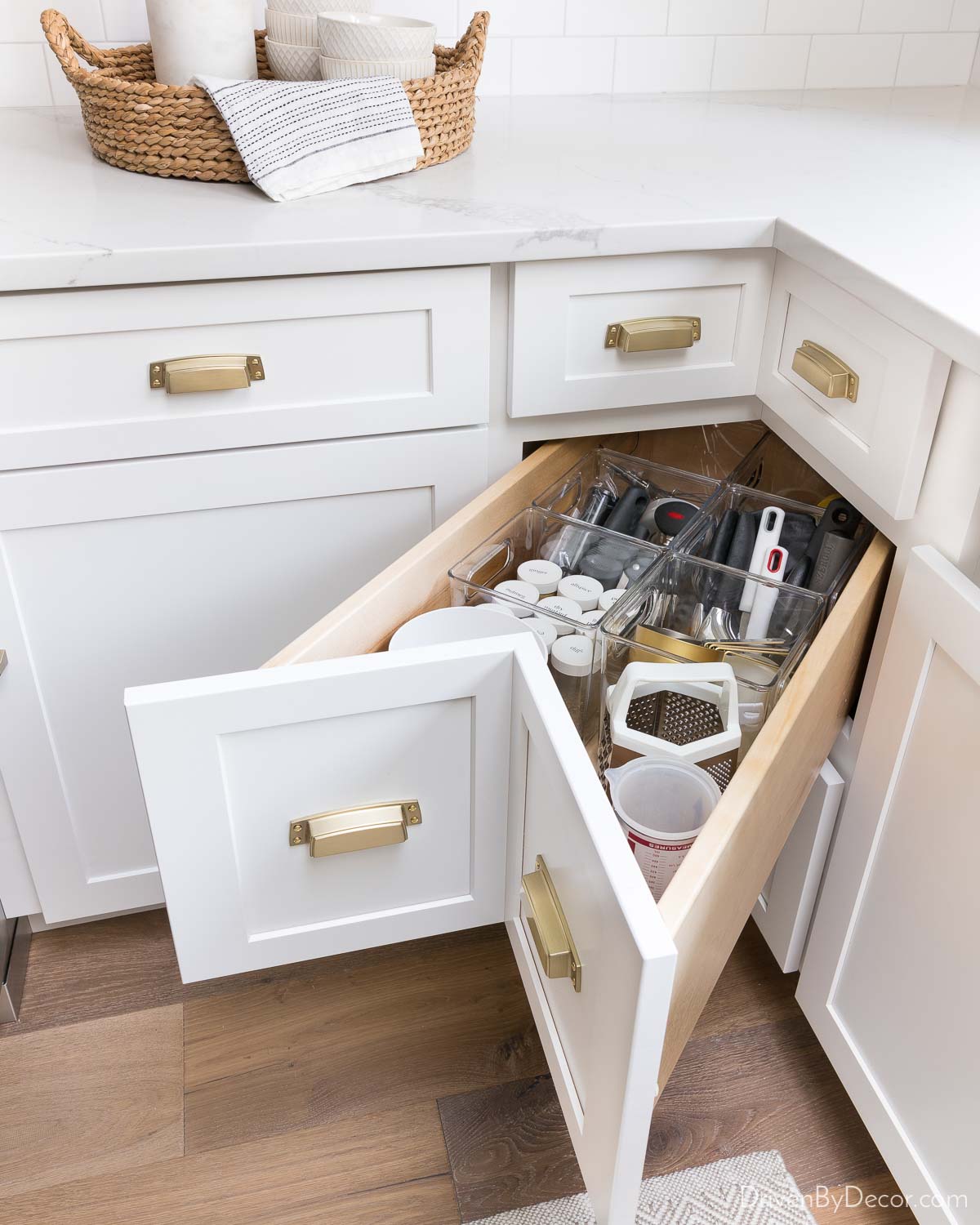 https://www.drivenbydecor.com/wp-content/uploads/2022/03/kitchen-remodel-idea-corner-drawer.jpg